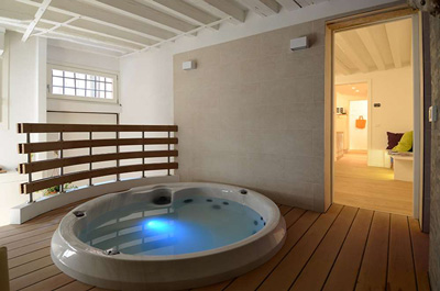 Nashville, TN Jacuzzi-Indoor Hot Tub Slip into your new Jacuzzi® Hot Tub and enjoy a relaxing soak that will help soothe sore and tired muscles, reduce the pain and stiffness of arthritis and ease stress.